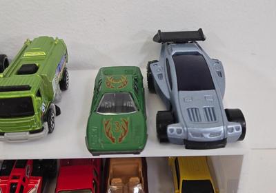 LOT 179: Race Cars, Lightning McQueen, Wrestling Cars, and More