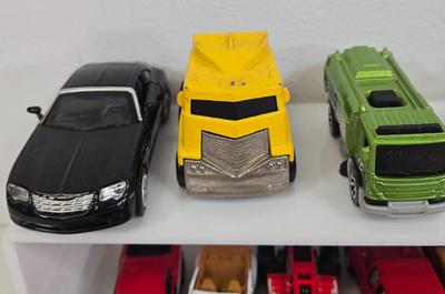 LOT 179: Race Cars, Lightning McQueen, Wrestling Cars, and More