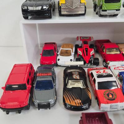 LOT 179: Race Cars, Lightning McQueen, Wrestling Cars, and More