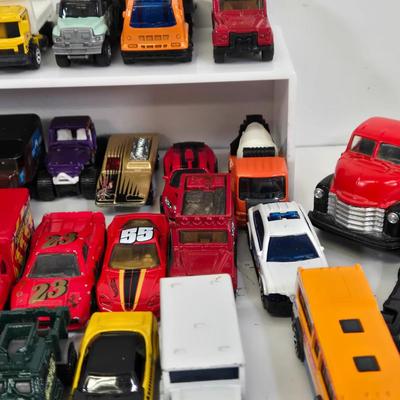 LOT 180: Fisher Price Bus, Car Pencil Sharpener, and More