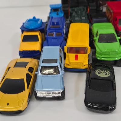 LOT 180: Fisher Price Bus, Car Pencil Sharpener, and More