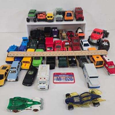 LOT 180: Fisher Price Bus, Car Pencil Sharpener, and More