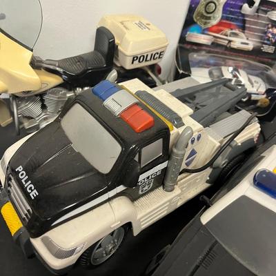 LOT 187: Police Vehicle -Themed Toys