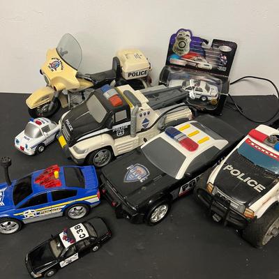 LOT 187: Police Vehicle -Themed Toys