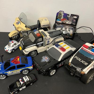 LOT 187: Police Vehicle -Themed Toys