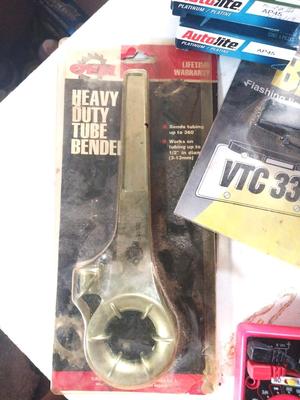 BACKUP ALARM-HEAVY DUTY TUBE BENDER--MULTI TESTER AND SPARKPLUGS