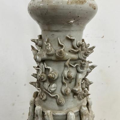 Sale Photo Thumbnail #91: . Funerary urns of this type, known as hunping (or "jar for the soul"), were often placed in tombs to provide a resting place for the deceased's soul.  does not come with shades, some tips around top are broken
Both measure: 31" high on wrought Iron Base