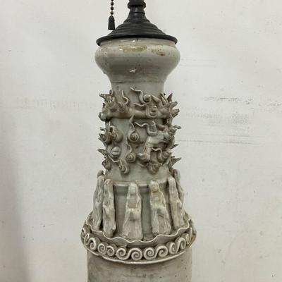 Sale Photo Thumbnail #95: . Funerary urns of this type, known as hunping (or "jar for the soul"), were often placed in tombs to provide a resting place for the deceased's soul.  does not come with shades, some tips around top are broken
Both measure: 31" high on wrought Iron Base