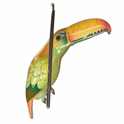 Sale Photo Thumbnail #191: Made of thick heavy papier-mâché with thick gloss and paint placed on copper perch 
Estimated $1200-$2000
measures 32" high from beak to tail 
body width is 9" 
body depth is 23" (beak to body)
perch is 22.5" wide x 26.5" high (copper) 
bottom of tail h