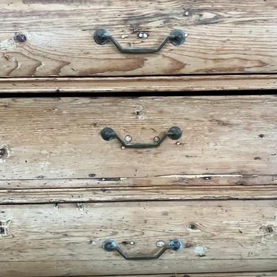 Sale Photo Thumbnail #247: Has spotted black molds, seven drawers, three shelves, hand carved face motif, floral wallpaper, top comes apart in three sections
Measures: 7'6" high x 56" wide x 21.5" deep