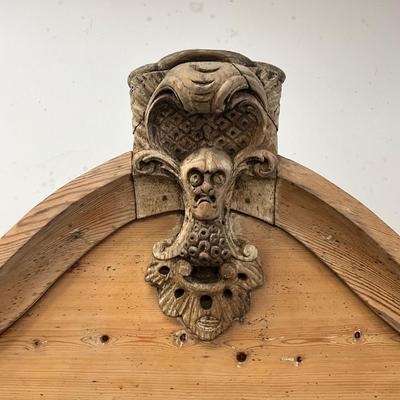 Sale Photo Thumbnail #252: Has spotted black molds, seven drawers, three shelves, hand carved face motif, floral wallpaper, top comes apart in three sections
Measures: 7'6" high x 56" wide x 21.5" deep