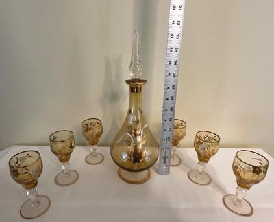 Sale Photo Thumbnail #120: Hand-blown in nature using colored amber glass and gold accents