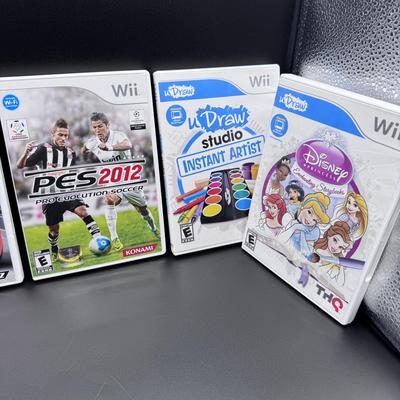 Wii Fit Plus Bundle w/16 games