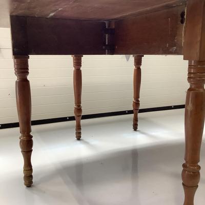 Sale Photo Thumbnail #434: drop-leaf table with crack on top
measuring 29.5" high x 47"wide x 5'3" long with leaves open
with leaves down 23" deep