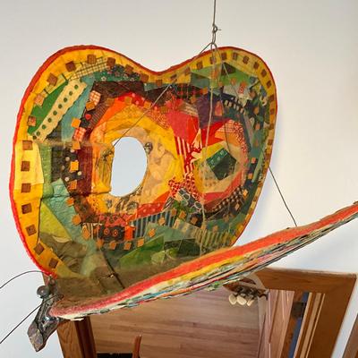 Sale Photo Thumbnail #487: Measures: 22.5" long x 14" wide x 17" high
Guitar wings have a collage mixed materials.