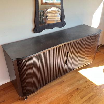 Sale Photo Thumbnail #553: Has adjustable shelves, has damage to front right and left corner, top is solid slate
Piece of veneer on the left bottom corner is coming off and it seems the feet have been replaced and are the original. Please refer to photos.
Measures: 6'7.5" wide x 22