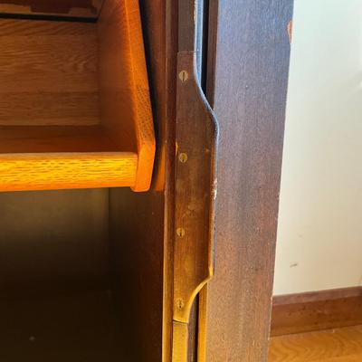 Sale Photo Thumbnail #542: Has adjustable shelves, has damage to front right and left corner, top is solid slate
Piece of veneer on the left bottom corner is coming off and it seems the feet have been replaced and are the original. Please refer to photos.
Measures: 6'7.5" wide x 22