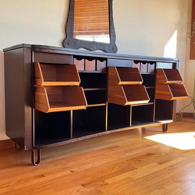 Sale Photo Thumbnail #545: Has adjustable shelves, has damage to front right and left corner, top is solid slate
Piece of veneer on the left bottom corner is coming off and it seems the feet have been replaced and are the original. Please refer to photos.
Measures: 6'7.5" wide x 22