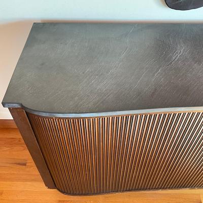 Sale Photo Thumbnail #551: Has adjustable shelves, has damage to front right and left corner, top is solid slate
Piece of veneer on the left bottom corner is coming off and it seems the feet have been replaced and are the original. Please refer to photos.
Measures: 6'7.5" wide x 22