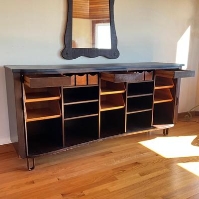 Sale Photo Thumbnail #540: Has adjustable shelves, has damage to front right and left corner, top is solid slate
Piece of veneer on the left bottom corner is coming off and it seems the feet have been replaced and are the original. Please refer to photos.
Measures: 6'7.5" wide x 22