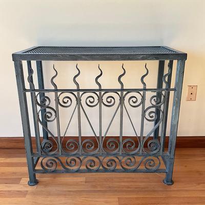 Sale Photo Thumbnail #580: Measures: 33.75" wide x 16" deep x 30.25" high
purchased in New Orleans 
19th century Iron Gates Transformed into console or endtables 
Est. Value $900.00