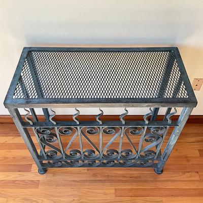 Sale Photo Thumbnail #581: Measures: 33.75" wide x 16" deep x 30.25" high
purchased in New Orleans 
19th century Iron Gates Transformed into console or endtables 
Est. Value $900.00