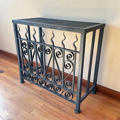 Sale Photo Thumbnail #579: Measures: 33.75" wide x 16" deep x 30.25" high
purchased in New Orleans 
19th century Iron Gates Transformed into console or endtables 
Est. Value $900.00