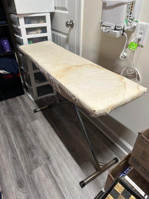 Sale Photo Thumbnail #506: Ironing Board- pretty old and rusty but it folds and would get the job done.