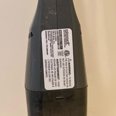 Sale Photo Thumbnail #518: Bissell 3-in-One Vac: Tested/Works/Flaw- See pics, the plastic on the edge where it sucks is broken off.