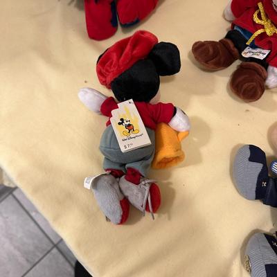 Sale Photo Thumbnail #581: Disney Lot Featuring Eeyore, Mickey, and Pooh- from vintage and loved Pooh to new with tags Mickeys, plus adorable and large Eeyore