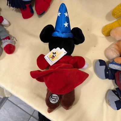 Sale Photo Thumbnail #578: Disney Lot Featuring Eeyore, Mickey, and Pooh- from vintage and loved Pooh to new with tags Mickeys, plus adorable and large Eeyore