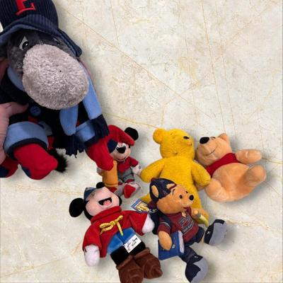 Sale Photo Thumbnail #593: Disney Lot Featuring Eeyore, Mickey, and Pooh- from vintage and loved Pooh to new with tags Mickeys, plus adorable and large Eeyore