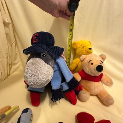 Sale Photo Thumbnail #592: Disney Lot Featuring Eeyore, Mickey, and Pooh- from vintage and loved Pooh to new with tags Mickeys, plus adorable and large Eeyore