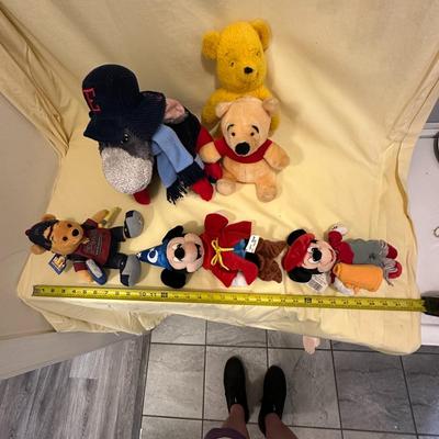 Sale Photo Thumbnail #591: Disney Lot Featuring Eeyore, Mickey, and Pooh- from vintage and loved Pooh to new with tags Mickeys, plus adorable and large Eeyore