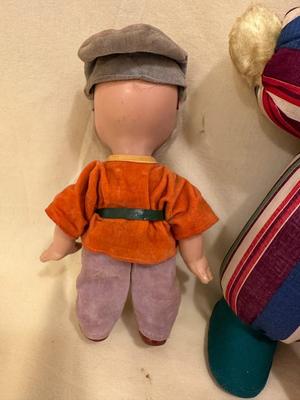 Sale Photo Thumbnail #643: Two Vintage Dolls, "Doc" from Snow White approx. 10" tall, Walt Disney and baby doll approx. 14" tall - both in good condition