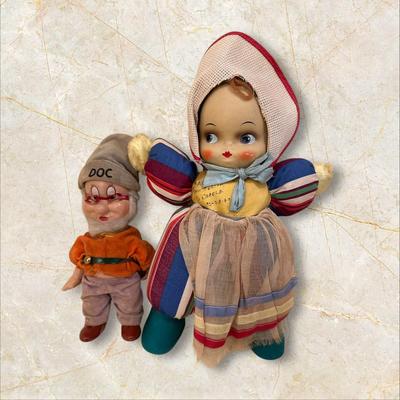 Sale Photo Thumbnail #635: Two Vintage Dolls, "Doc" from Snow White approx. 10" tall, Walt Disney and baby doll approx. 14" tall - both in good condition