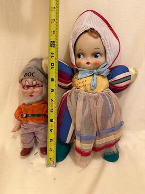 Sale Photo Thumbnail #640: Two Vintage Dolls, "Doc" from Snow White approx. 10" tall, Walt Disney and baby doll approx. 14" tall - both in good condition