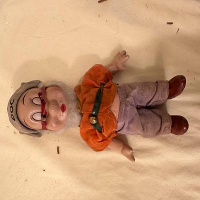 Sale Photo Thumbnail #636: Two Vintage Dolls, "Doc" from Snow White approx. 10" tall, Walt Disney and baby doll approx. 14" tall - both in good condition