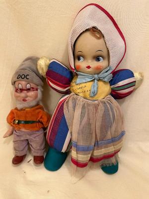 Sale Photo Thumbnail #639: Two Vintage Dolls, "Doc" from Snow White approx. 10" tall, Walt Disney and baby doll approx. 14" tall - both in good condition