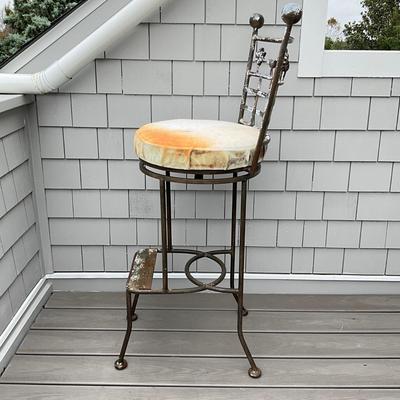 Sale Photo Thumbnail #675: Stools are heavily weathered, needs TLC. structurally sound , fresh paint and new seats and they will be good as new! 
Both measure: 45" high x 18" deep x 18" wide x 31" seat height
with ball tops and botanical theme of leaves, trees, birds on the back an