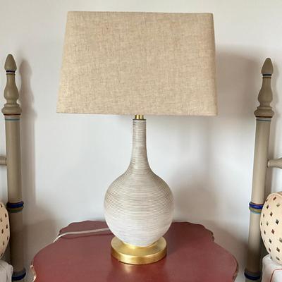 Sale Photo Thumbnail #729: Antique White resin lamp with gold accent base
Measures: 26.5" high x 9" diameter body