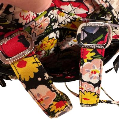 Sale Photo Thumbnail #924: Two Matching Vera Bradley Pieces Quilted Backpack with Front Pocket and Small Crossbody Clutch Bag 
Pattern appears ti be Poppy Fields. 
Excellent barely even used condition!