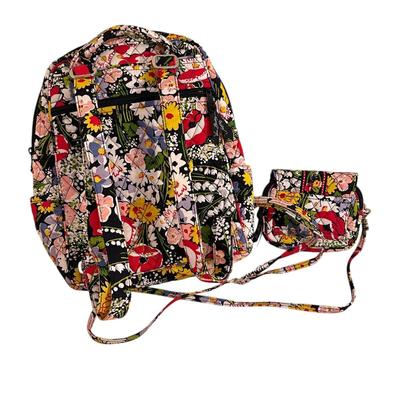Sale Photo Thumbnail #921: Two Matching Vera Bradley Pieces Quilted Backpack with Front Pocket and Small Crossbody Clutch Bag 
Pattern appears ti be Poppy Fields. 
Excellent barely even used condition!