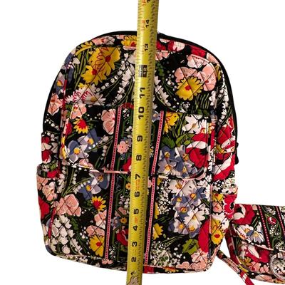 Sale Photo Thumbnail #927: Two Matching Vera Bradley Pieces Quilted Backpack with Front Pocket and Small Crossbody Clutch Bag 
Pattern appears ti be Poppy Fields. 
Excellent barely even used condition!