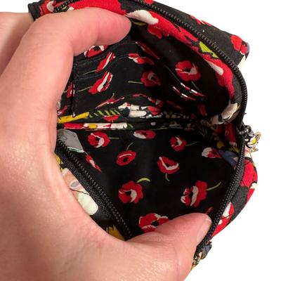 Sale Photo Thumbnail #925: Two Matching Vera Bradley Pieces Quilted Backpack with Front Pocket and Small Crossbody Clutch Bag 
Pattern appears ti be Poppy Fields. 
Excellent barely even used condition!