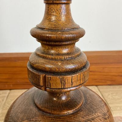Sale Photo Thumbnail #845: Has two areas of damage on top, and one chip on lower stem, refer to photos
Made of oakwood
Measures: 33" high x 9" wide base x 5.5" diameter top
