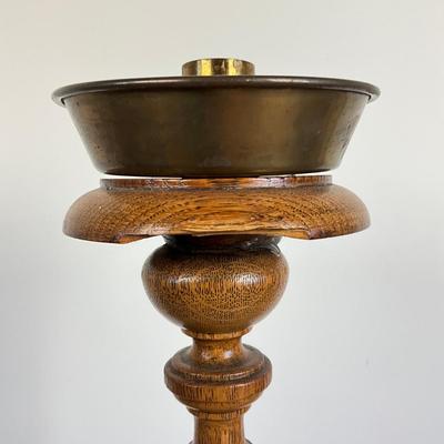 Sale Photo Thumbnail #847: Has two areas of damage on top, and one chip on lower stem, refer to photos
Made of oakwood
Measures: 33" high x 9" wide base x 5.5" diameter top