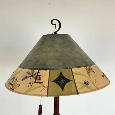 Sale Photo Thumbnail #935: Measures: 5'2" high x 18" shade diameter x 11.5" base diameter
Handpainted shade and signed 
very good condition