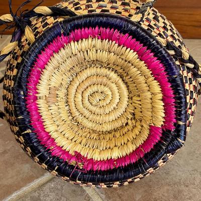 Sale Photo Thumbnail #942: From Kwazulu-Natal Sooth Africa "UKHAMBA Basket"
Measures: 10" high x 10" diameter x 18" high with handle