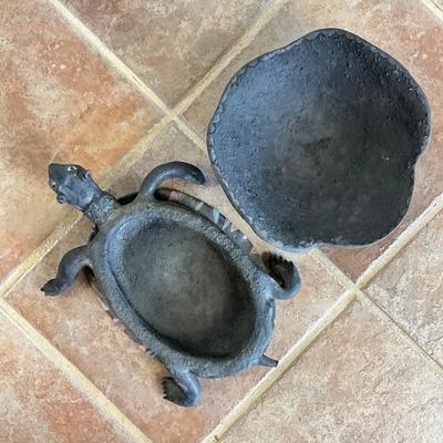 Sale Photo Thumbnail #983: Covered Turtle , top lifts off 
Has broken toes, swirled horn and tail, see photos
Measures: 16" long x 10.5" wide x 4" high